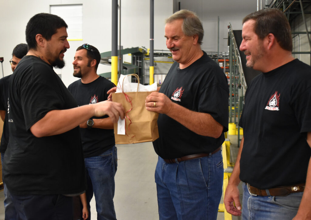 Jim Arnold Handing Out Bags